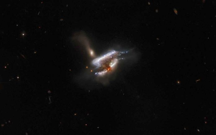 Hubble captures swirling galactic trio