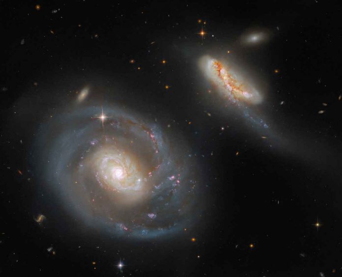 Hubble peers at peculiar pair of galaxies