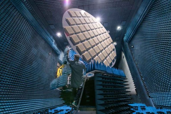 The largest antenna ever tested in ESA's Hertz radio frequency test chamber