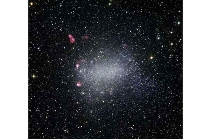 International team of astronomers study dwarf irregular galaxy NGC 6822